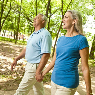 Middle Aged Couple Exercising