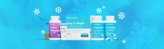 A selection of wellness gummies, topicals, and supplements set against a bright blue background with white snowflakes. 