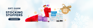 VitaMedica Gummies, Arnica Montana Products, and Clear Skin natural skincare products as Christmas stocking stuffers. Shown with red and white stockings, against a blue and white winter backdrop with gold snowflakes.  